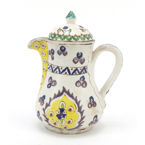 232 - Turkish Kutahya pottery coffee pot hand painted with flowers, 18cm high