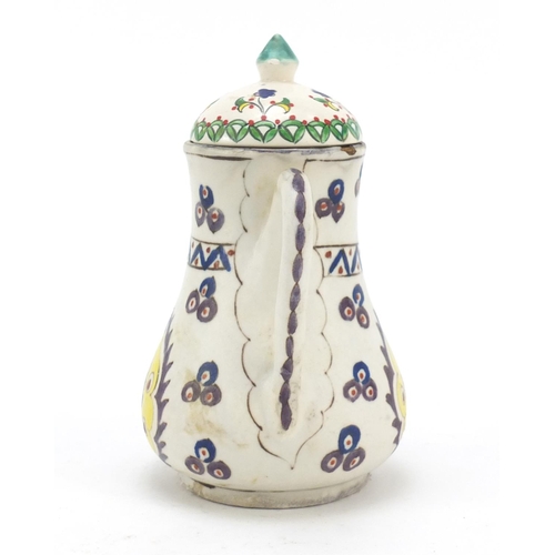 232 - Turkish Kutahya pottery coffee pot hand painted with flowers, 18cm high