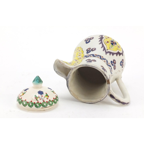 232 - Turkish Kutahya pottery coffee pot hand painted with flowers, 18cm high