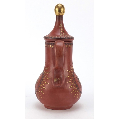 233 - Turkish Tophane terracotta water jug incised and painted with flower heads, 27cm high