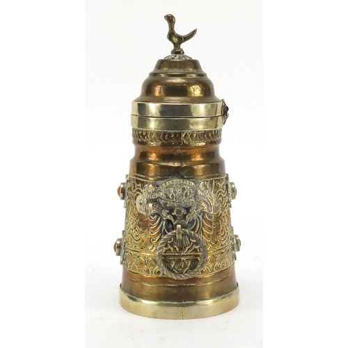 616 - Tibetan brass pot with hinged lid and ring handles, 22.5cm high