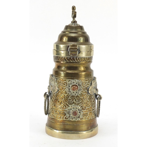 616 - Tibetan brass pot with hinged lid and ring handles, 22.5cm high