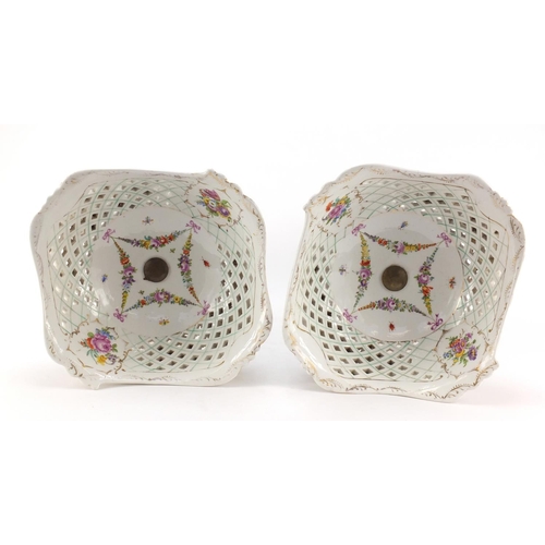 735 - Large pair of Dresden floral encrusted porcelain centrepieces with pierced baskets on naturalistic s... 