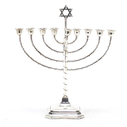 141 - Silver plated Jewish Menorah candlestick, 22.5cm high