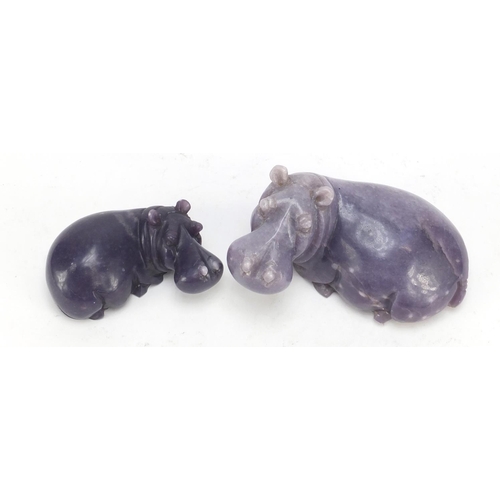 450 - Two Chinese carved hardstone hippopotamuses, the largest 19cm wide