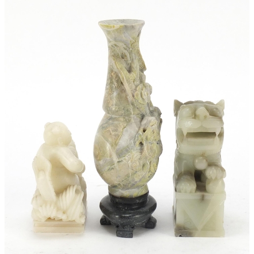 2018 - Chinese hardstone and soapstone carvings including a dragon vase on stand, the largest 21.5cm high