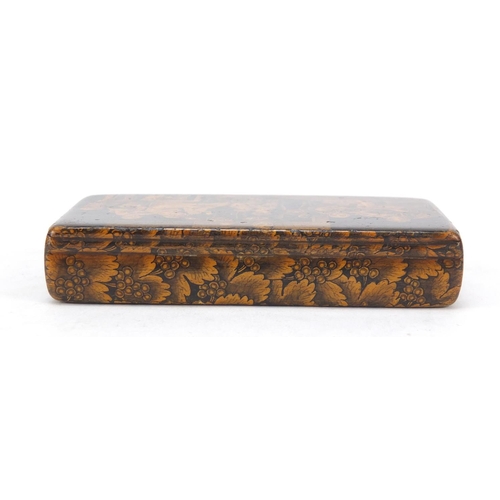 414 - 19th century lacquered treen snuff box, the hinged lid depicting a blind fiddley, 9.5cm wide