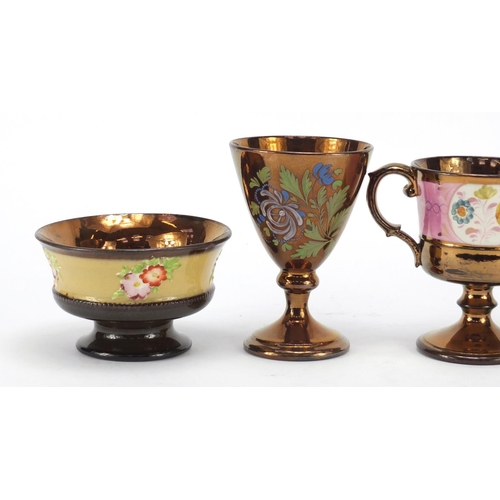 745 - Welsh lustre ware including a twin handled pedestal cup and jug, the largest 13cm high