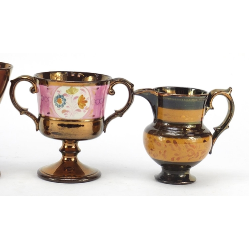 745 - Welsh lustre ware including a twin handled pedestal cup and jug, the largest 13cm high