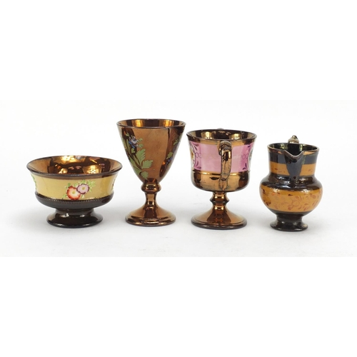 745 - Welsh lustre ware including a twin handled pedestal cup and jug, the largest 13cm high