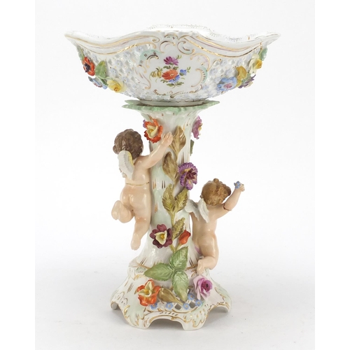 736 - 19th century floral encrusted Dresden porcelain centrepiece and mirror, each mounted with cherubs, t... 