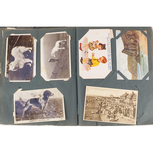 499 - Edwardian and later postcards arranged in an album including Margaret Tarrant, Mabel Lucy Attwell, L... 