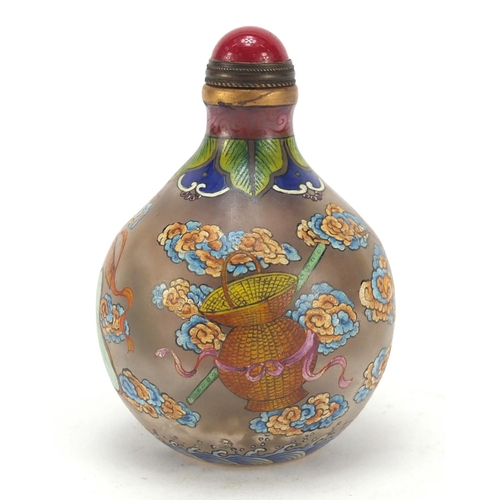 585 - Chinese glass snuff bottle hand painted with Daoist emblems, character marks to the base, 8cm high