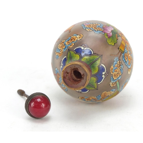 585 - Chinese glass snuff bottle hand painted with Daoist emblems, character marks to the base, 8cm high