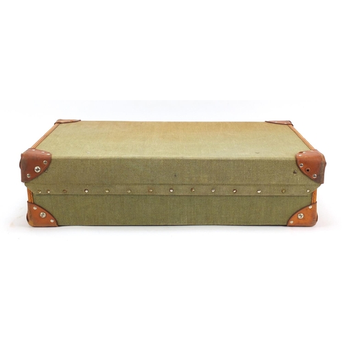 1170 - Military interest leather bound canvas suitcase, stamped marks to the interior, 25.5cm wide
