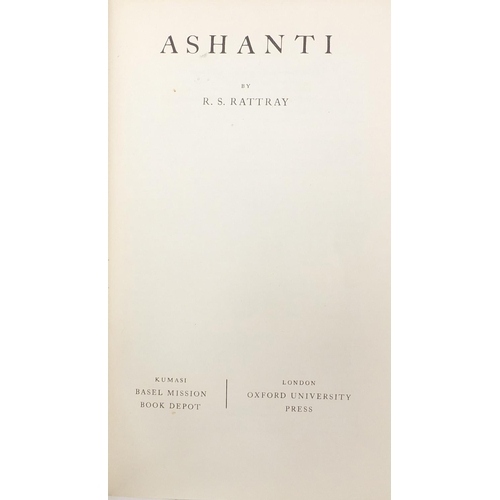 627 - Eleven African bronzed Ashanti gold weights and two reference books, The History of the Gold Coast a... 