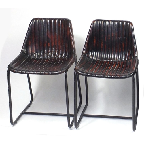1395 - Pair of industrial chairs with brown upholstery, each 79cm high