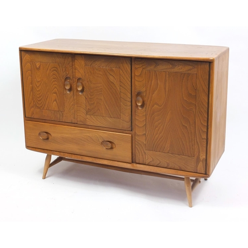 1301 - Ercol Windsor light elm sideboard with three cupboard doors and a drawer, 82cm H x 114cm W x 48cm D