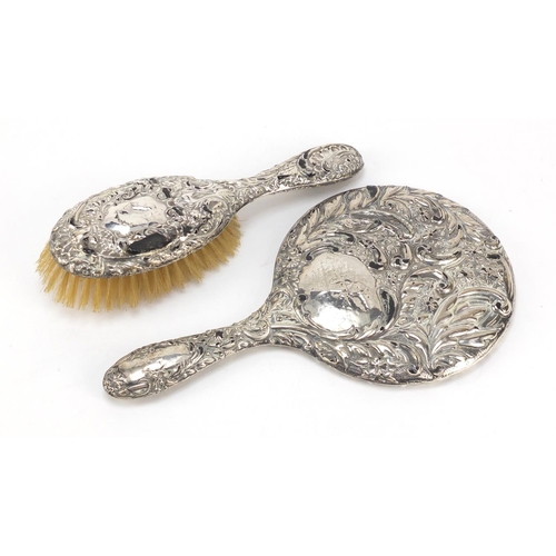 759 - Four Victorian and later silver mounted dressing table items including hand mirror, clothes brush an... 