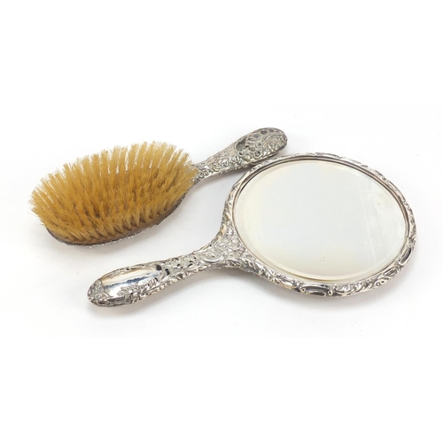 759 - Four Victorian and later silver mounted dressing table items including hand mirror, clothes brush an... 