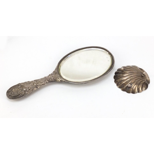 539 - Silver items comprising four slice toast rack, shell shaped dish and hand mirror, various hallmarks,... 