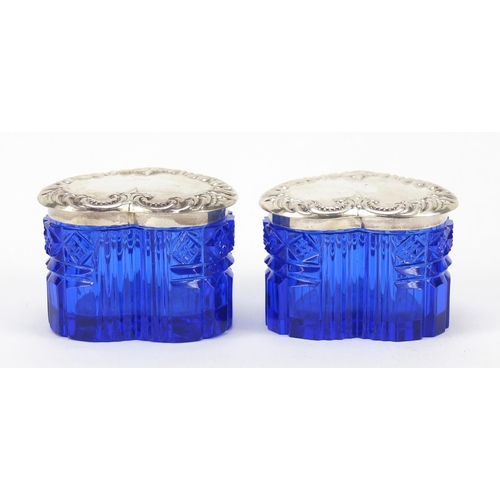 307 - Pair of blue cut glass love heart shaped boxes with sterling silver lids, 4.5cm high