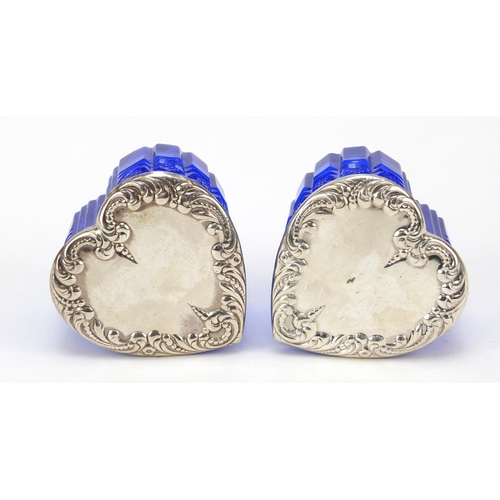 307 - Pair of blue cut glass love heart shaped boxes with sterling silver lids, 4.5cm high