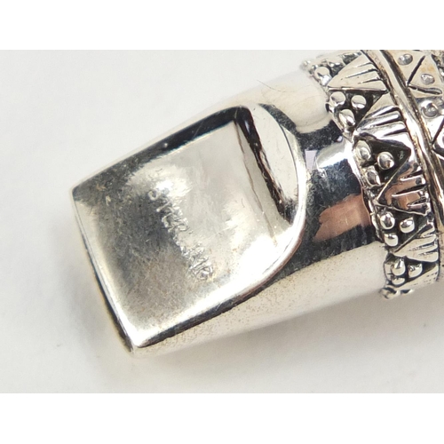 456 - Sterling silver whistle in the form of a cat, 4.5cm in length, 14.6g