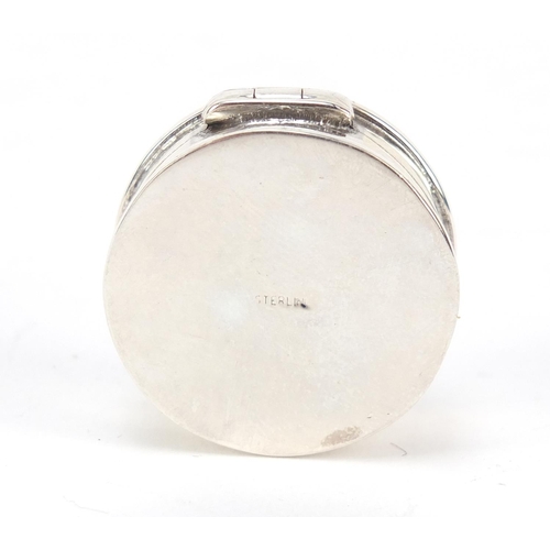 458 - Circular sterling silver patch box, the hinged lid with enamelled Masonic emblem, 2.6cm in diameter,... 