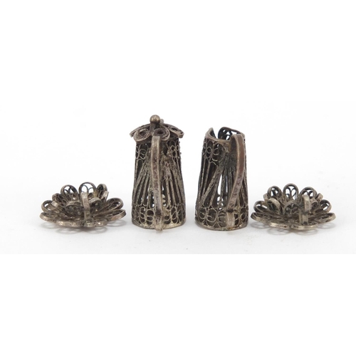 266 - Unmarked filigree silver coloured metal dolls house tea service on tray, the tray 11cm in length, 40... 