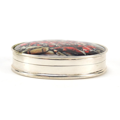 540 - Oval silver snuff box with hinged lid enamelled with a battle scene, 5.5cm wide, 43.2g