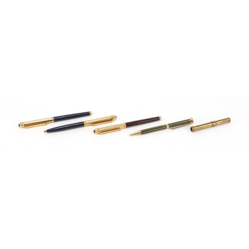 2019 - Three Playboy ballpoint pens, a Jaguar ballpoint pen and a gilt metal propelling pencil