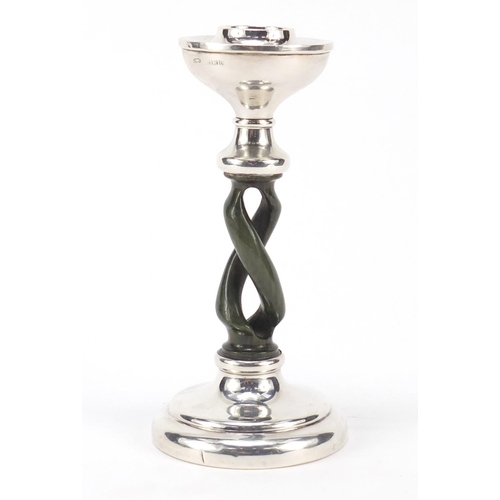 546 - Silver candlestick with Bakelite design stem, indistinct hallmarks, 14cm high