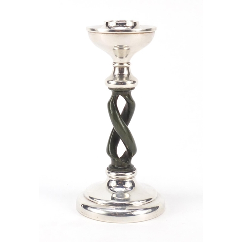 546 - Silver candlestick with Bakelite design stem, indistinct hallmarks, 14cm high