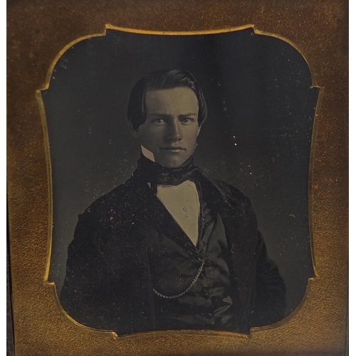 493 - 19th century daguerreotype of a young gentleman in formal dress, 9.5cm high