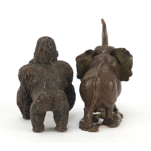 578 - Two Japanese patinated bronze animals of a gorilla and elephant, the largest 5cm high