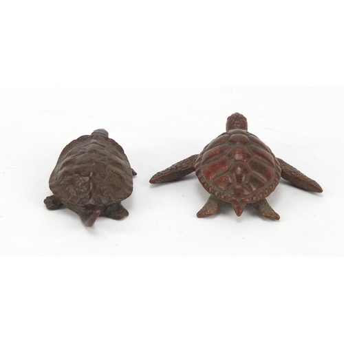 714 - Two Japanese patinated bronze animals comprising a turtle and terrapin, each with impressed marks to... 