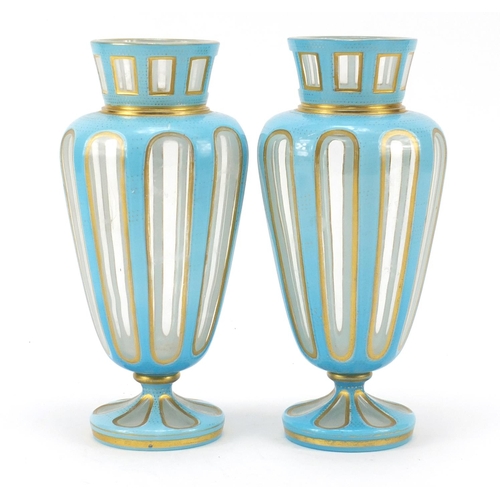 51 - Pair of 19th century French blue opaline vases with gilt borders, 22cm high