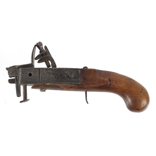 64 - Antique Tinder pistol lighter, 18cm in length