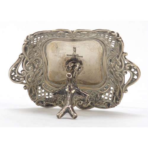 267 - Unmarked silver ring tree with pierced tray, 7cm high, 46.2g