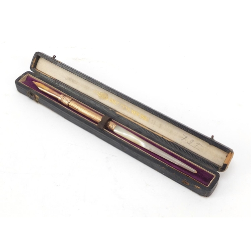 384 - John Holland mother of pearl dip pen with gold coloured metal mounts and fitted box