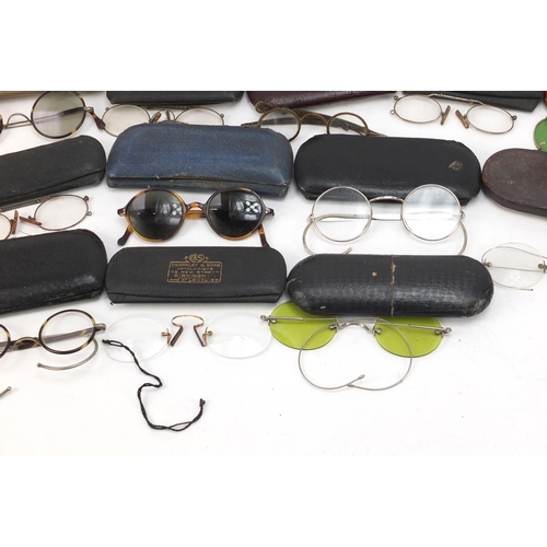 385 - Collection of Victorian and later spectacles including faux tortoiseshell framed examples