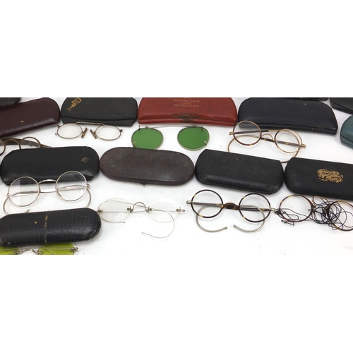 385 - Collection of Victorian and later spectacles including faux tortoiseshell framed examples