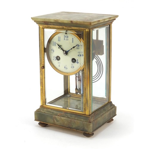 36 - 19th century French onyx and brass four glass mantle clock striking on a gong, the enamelled dial wi... 