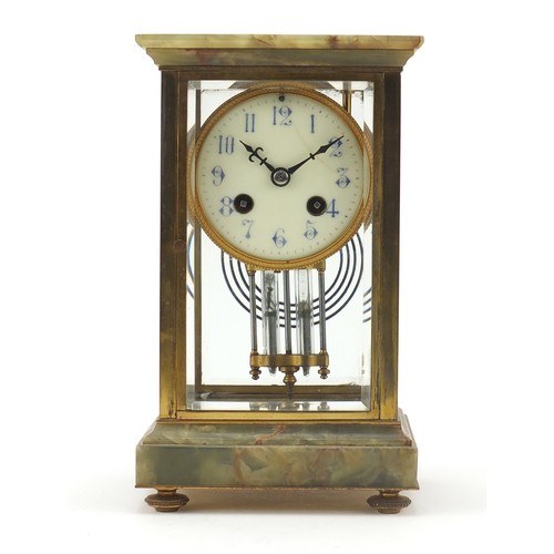 36 - 19th century French onyx and brass four glass mantle clock striking on a gong, the enamelled dial wi... 