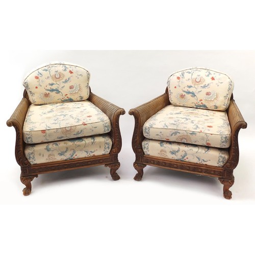 1327 - Victorian walnut framed double bergere three piece suite, each with carved scrolling arms on claw an... 