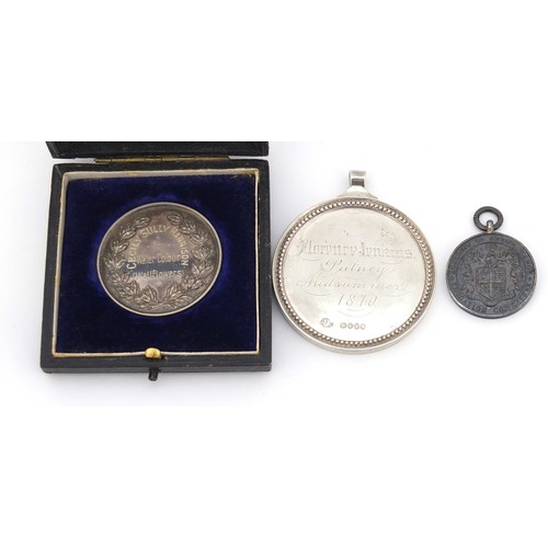 528 - Victorian silver medal with cast beaded rim by John Evans II, inscribed Florence Jenkins Putney, 5cm... 