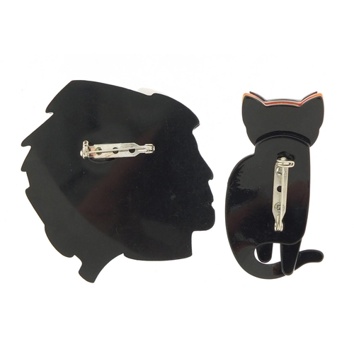 471 - Two Art Deco design brooches in the form of a Native American's head and a stylised cat, the largest... 