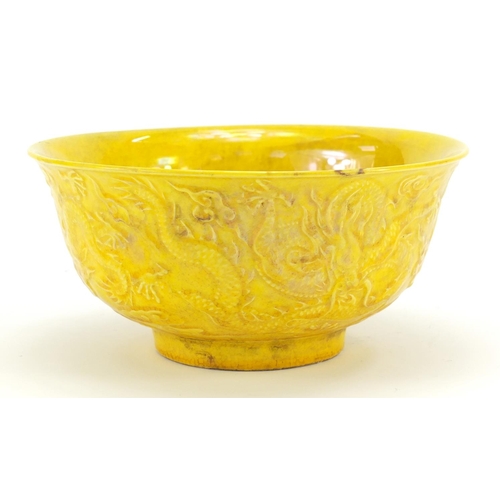 570 - Chinese yellow glazed porcelain dragon bowl, six figure character marks to the base, 15.5cm in diame... 