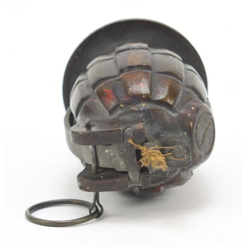 665 - Military interest grenade table lighter, 9.5cm high